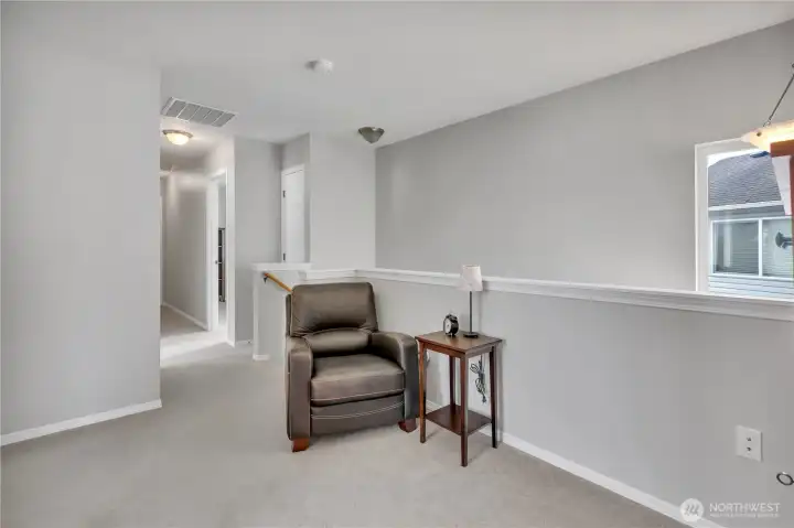 Loft area at the top of the stairs.