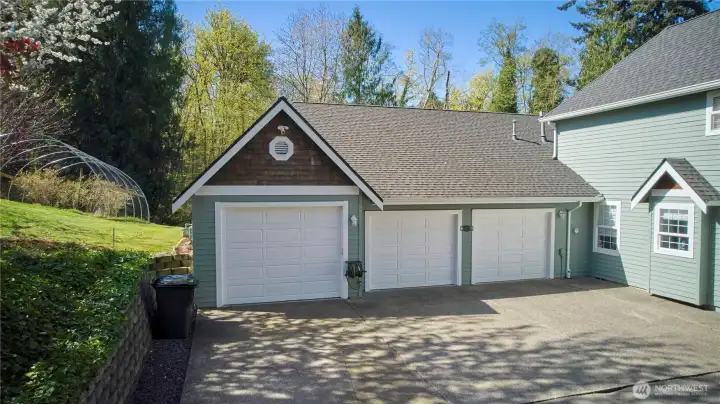 Attached 3-Car Garage that is a total of over 1,400sf. Deep enough to fit 2 car tandem.