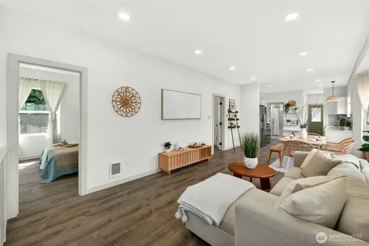 Fully updated open concept living room, dining room and kitchen.