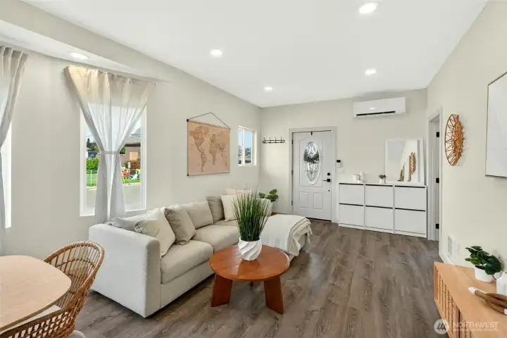 Fully updated open concept living room, dining room and kitchen.