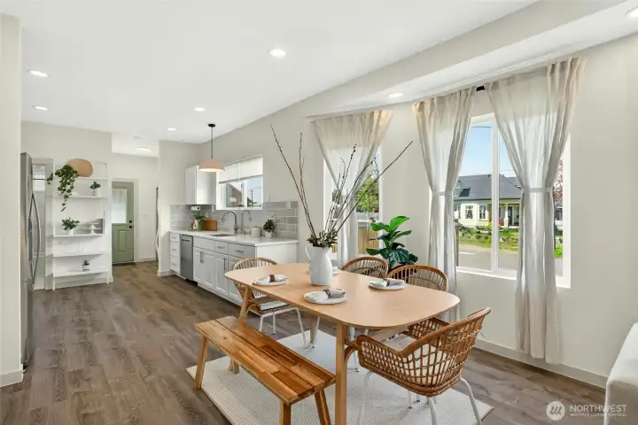 Fully updated open concept living room, dining room and kitchen.