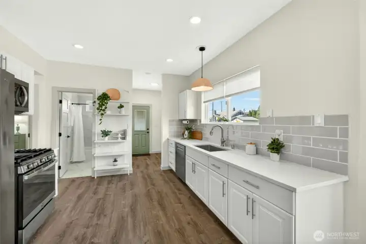 Fully updated open concept living room, dining room and kitchen.