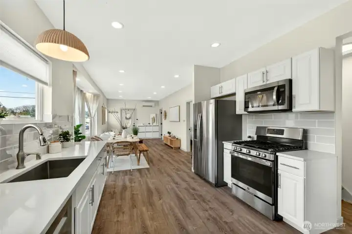 Fully updated open concept living room, dining room and kitchen.