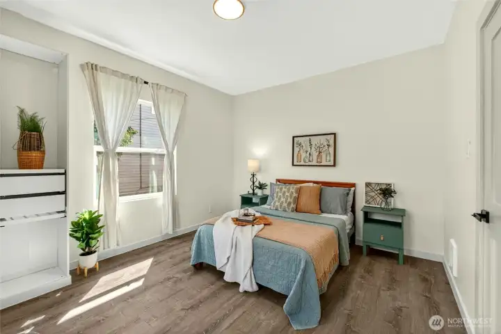 2nd bedroom is spacious with lots of light on the main floor.