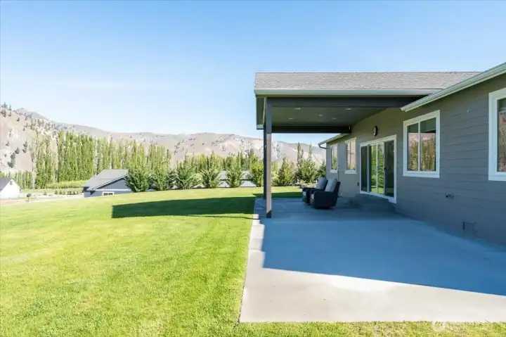 Covered patio facing the river & mountain view!