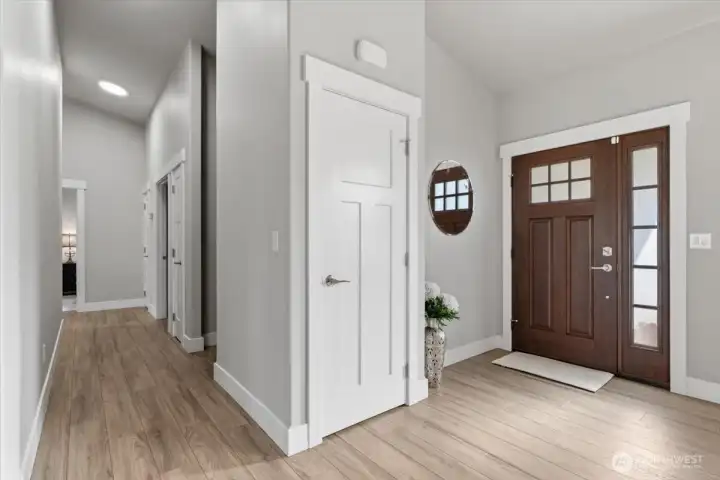 Front door and hallway to provide separation from primary and living areas and additional bedrooms