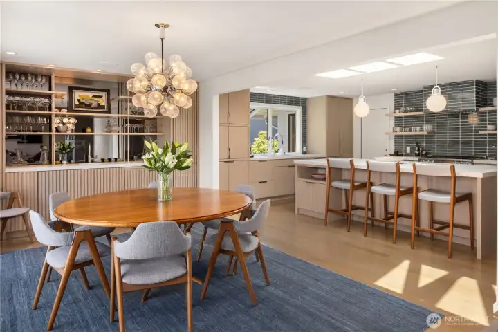 Dining room and fab bar are open to the kitchen and living room. Dining room and fab bar are open to the kitchen and living room.