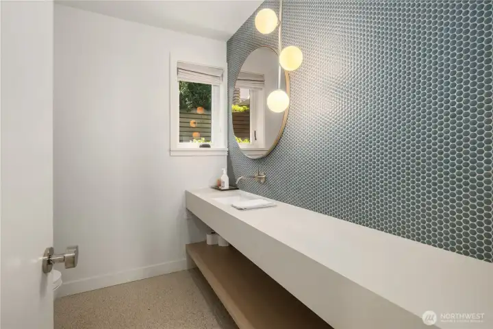 Half bathroom on the lower level. Half bathroom on the lower level.