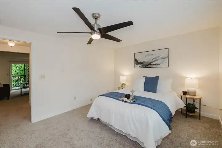 Large bedroom with ceiling fan and walk-in closet Large bedroom with ceiling fan and walk-in closet