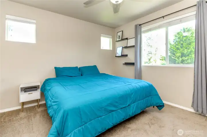 Primary bedroom with nice privacy windows Primary bedroom with nice privacy windows