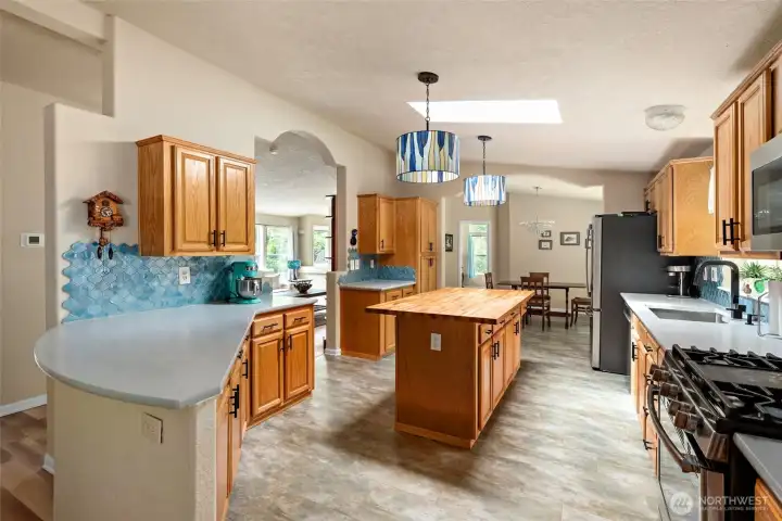 Kitchen is heart of home opening to all living spaces