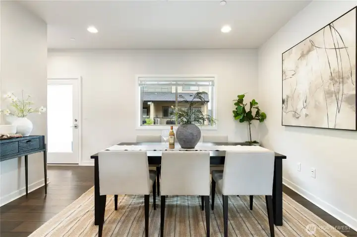Dining area overlooking covered deck.