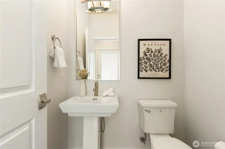 Convenient guest  powder room on main level