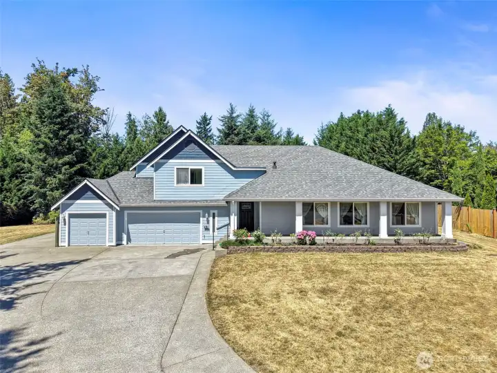 Almost a full acre, 3 car garage, additional parking and plenty of yard!