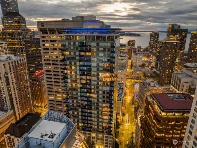 Embrace the excitement of city living in this upscale Seattle condo on the 35th floor of Olive 8, where sleek design meets vibrant urban energy, all with captivating water views as your backdrop.