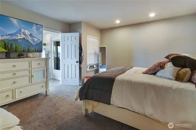 Primary BR with access to living room and exterior door to deck.
