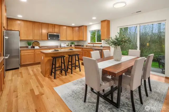 Open Kitchen and Dining over look the private backyard, making indoor and outdoor entertaining very easy.