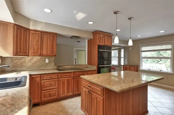 granite countertops, built in cabinetry.