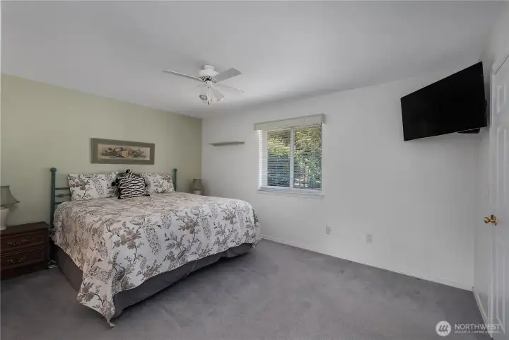 Primary bedroom with two walk in closets.