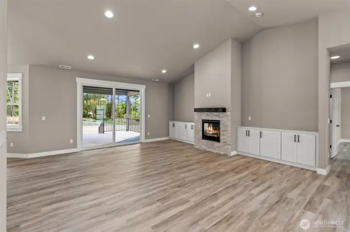 Living Room with Vaulted Ceilings and Cozy Gas FP