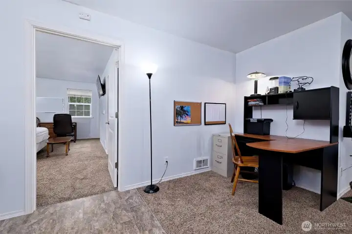 Office area in the apartment over the garage, leading into the huge bedroom.