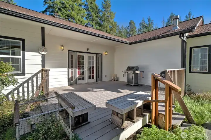 Really nice back deck. Great place to sip a drink and enjoy watching the deer meander through.