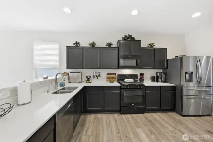 Kitchen has Spacious Counters and Energy Efficient Appliances