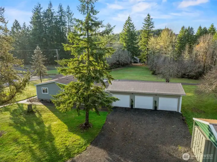 3-car oversized garage with epoxy flooring, extra living space,