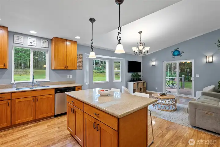 Kitchen is open to the living room & easy access to the back yard.