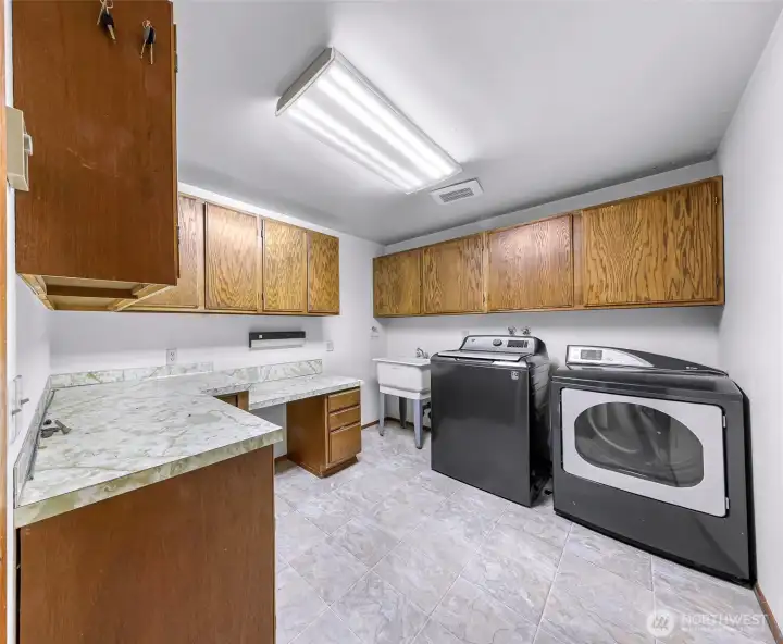 Brand new flooring in laundry room.