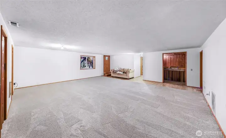 Brand new carpet in huge downstairs bonus room. Bonus room has it's own exterior entrance, offering possible ADU potential.