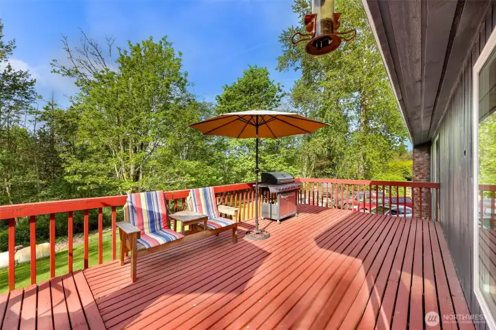 Deck overlooking grounds and pool.