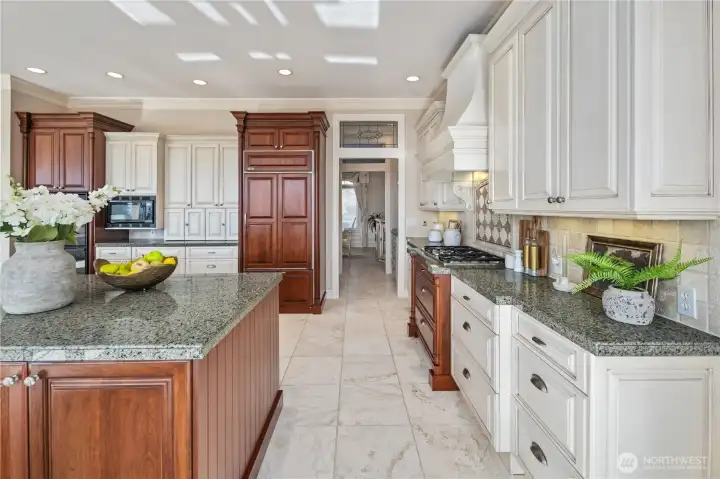 Designer chef's kitchen with premium stainless steel appliances