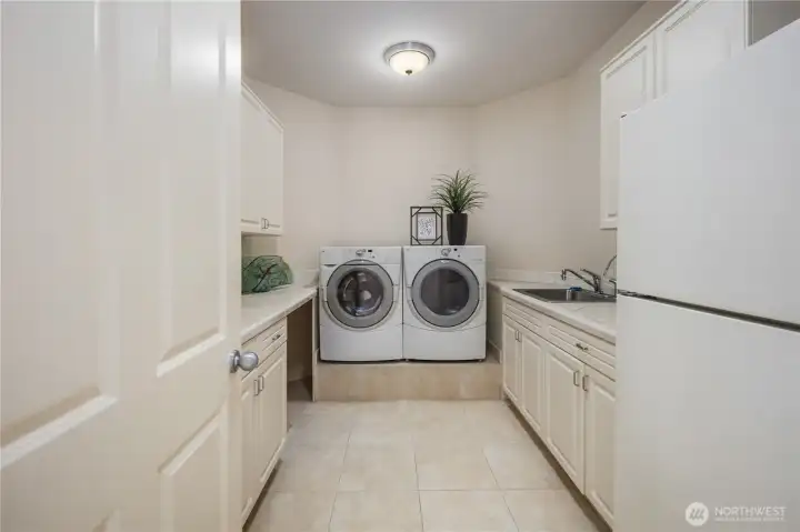 Utility room next to primary suite
