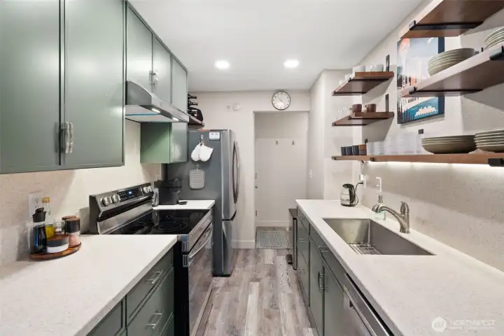 Modern updates include oversize sink floating shelves and low voltage lighting.