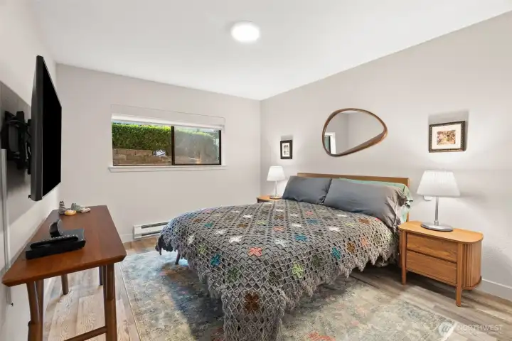 Good size room for a primary bedroom.