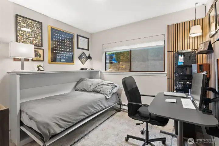 Open Murphy bed is so convenient for guests.