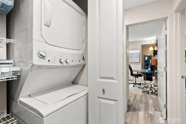 Updated stackable washer/dryer and updated hot water tank in convenient closet.