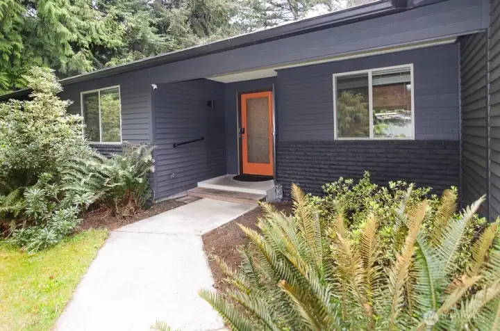 Great curb appeal with mature landscaping.