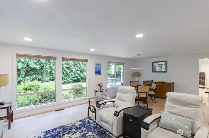 Living with this view offers year round enjoyment.  Floor to ceiling windows brings in color and light.