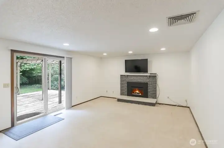 Family room, complete with gas fireplace.  This space is quite large.