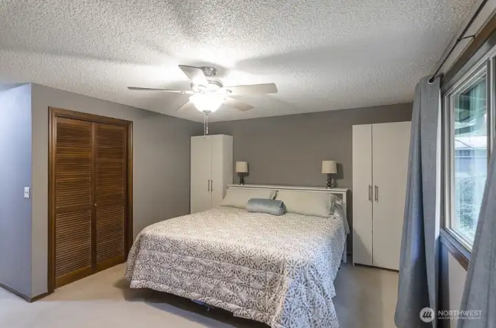 The primary bedroom has two closets and private en-suite
