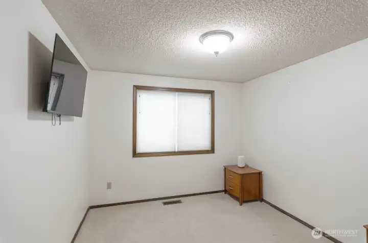 This is the private den, which has a closet.  It is located off the family room.