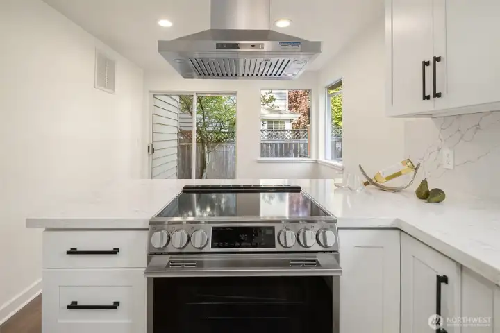 Stainless steel appliances compliment the design.