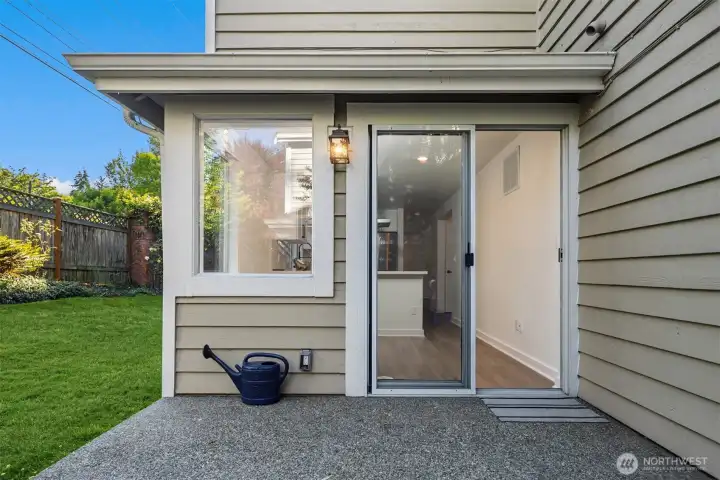 Sliding doors invite indoor-outdoor living.