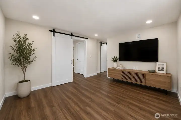 Den or primary en suite? Virtually staged but TV wall is wired.