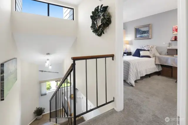 An open staircase accesses the upper level of the home.