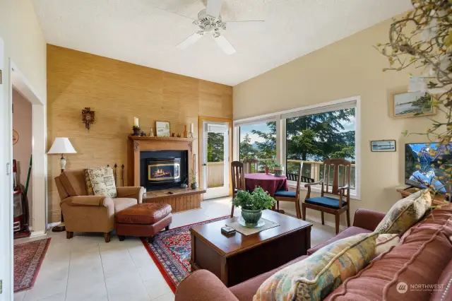 Lower-level living room with gas fireplace and separate deck and entrance