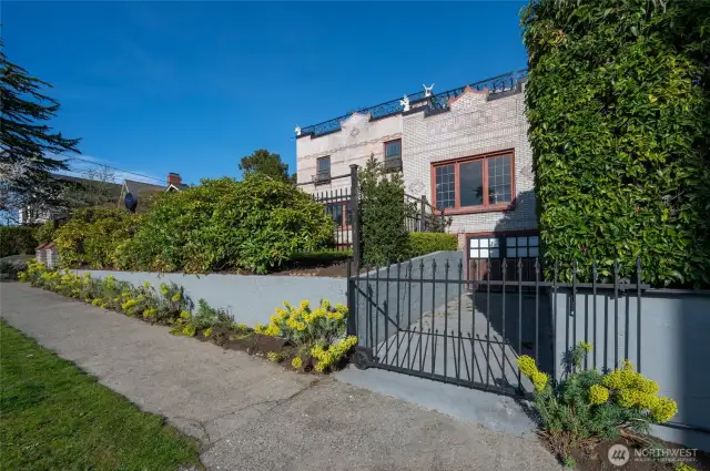 Gated courtyard entry with gated driveway