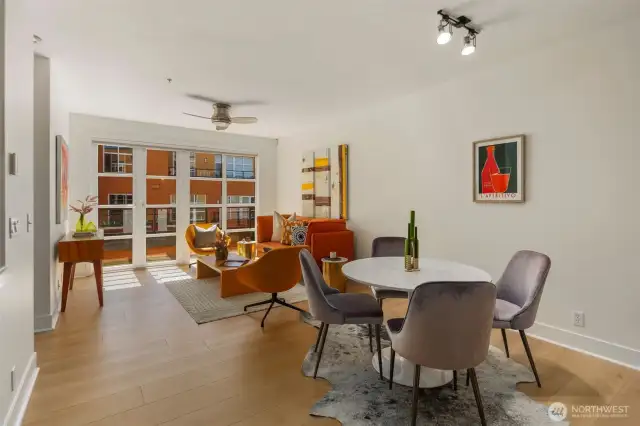 Room for dining and barstool sitting at kitchen counter.